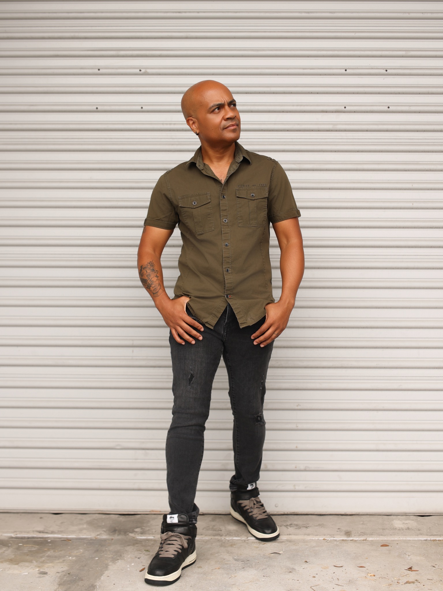 Full-length lifestyle portrait of Eric Velez